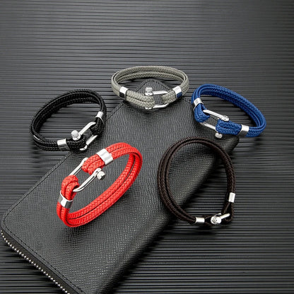 Pulsera de Cuero Trenzado Multicapa – con Grillete en U de Acero Inoxidable