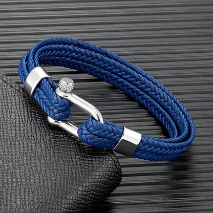 Pulsera de Cuero Trenzado Multicapa – con Grillete en U de Acero Inoxidable